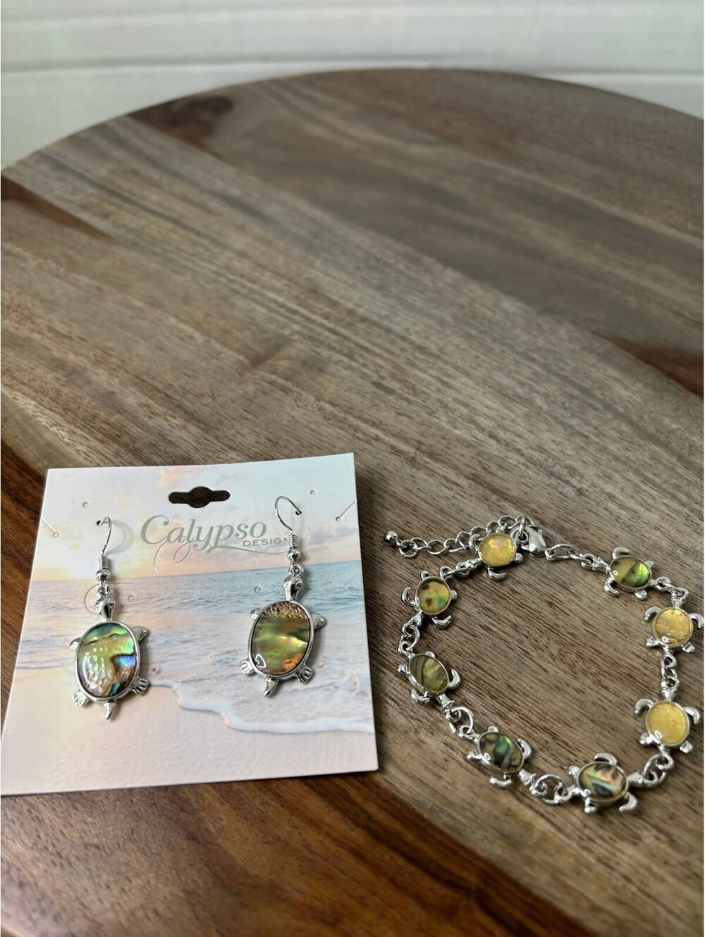 matching set of ocean-themed sea turtle jewelry